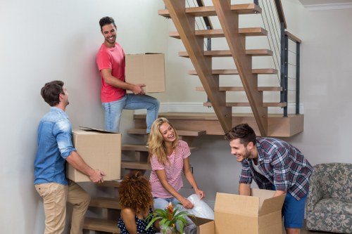 Professional movers loading items carefully for a Knightsbridge relocation