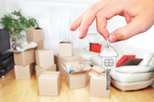 Professional moving team working safely with equipment