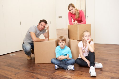 Professional moving team in Knightsbridge focusing on safe loading and delivery