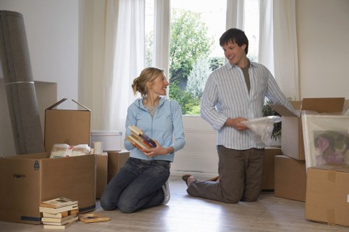 Packed boxes and furniture ready for a moving truck in Knightsbridge